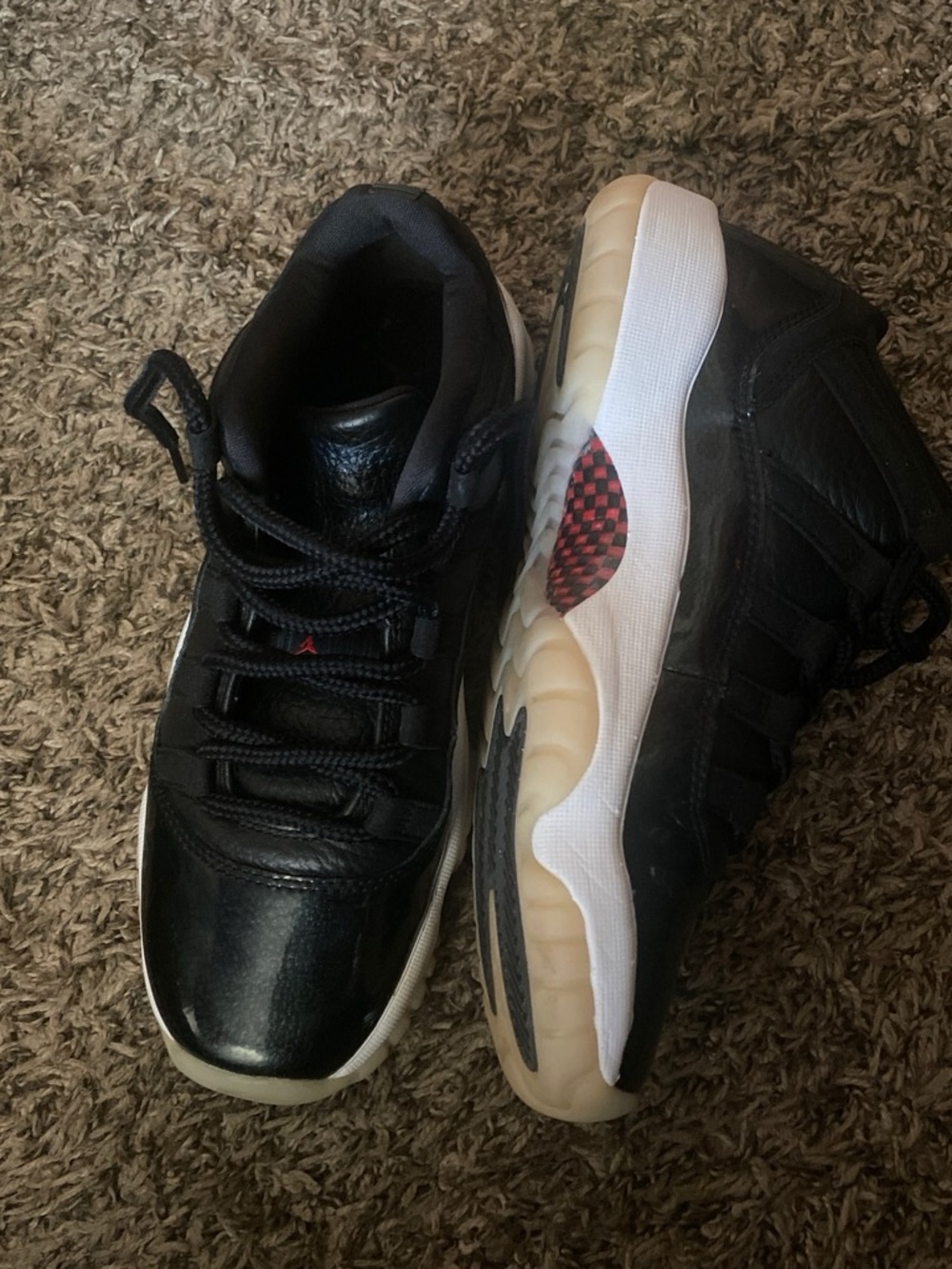 black white and red jordan 11